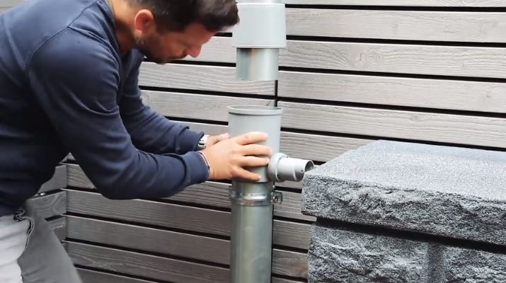 installatie van een regenwatercollector in plaats van een goot